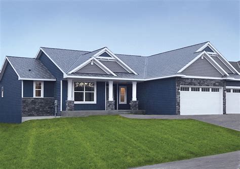 houses with dark blue metal roofs|houses with blue roofs pictures.